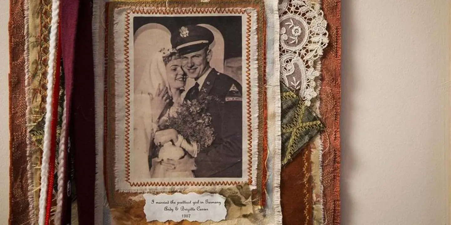 Black and white picture of a newly married couple before the husband goes off to the military.