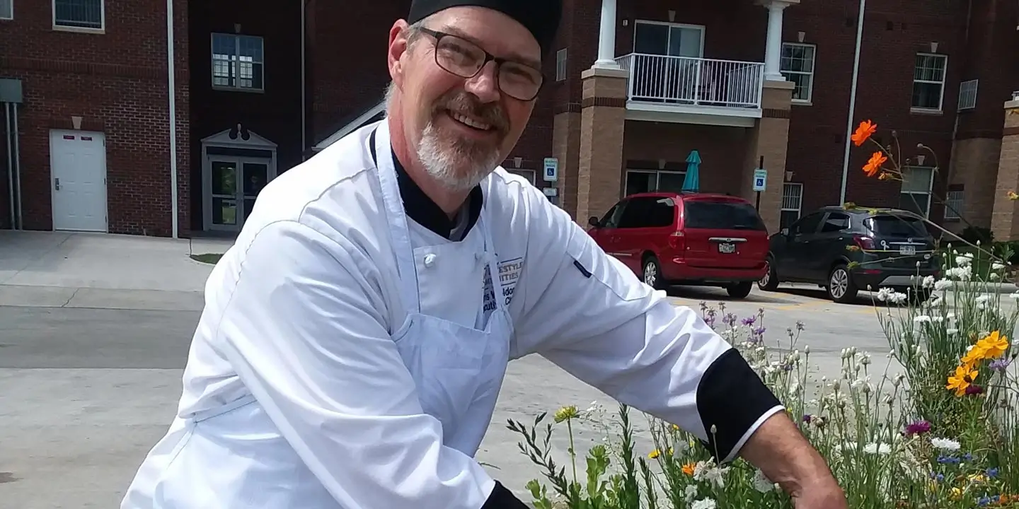 Chef Chris taking care of flowers