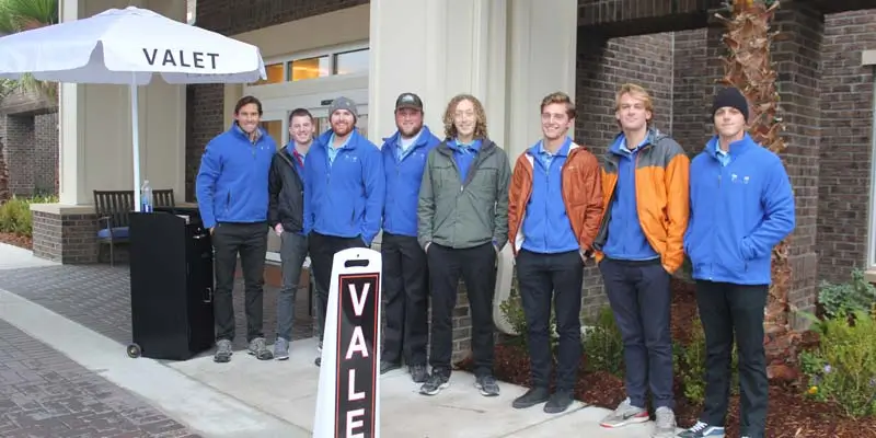 Daniel Point employees giving valet for residents.