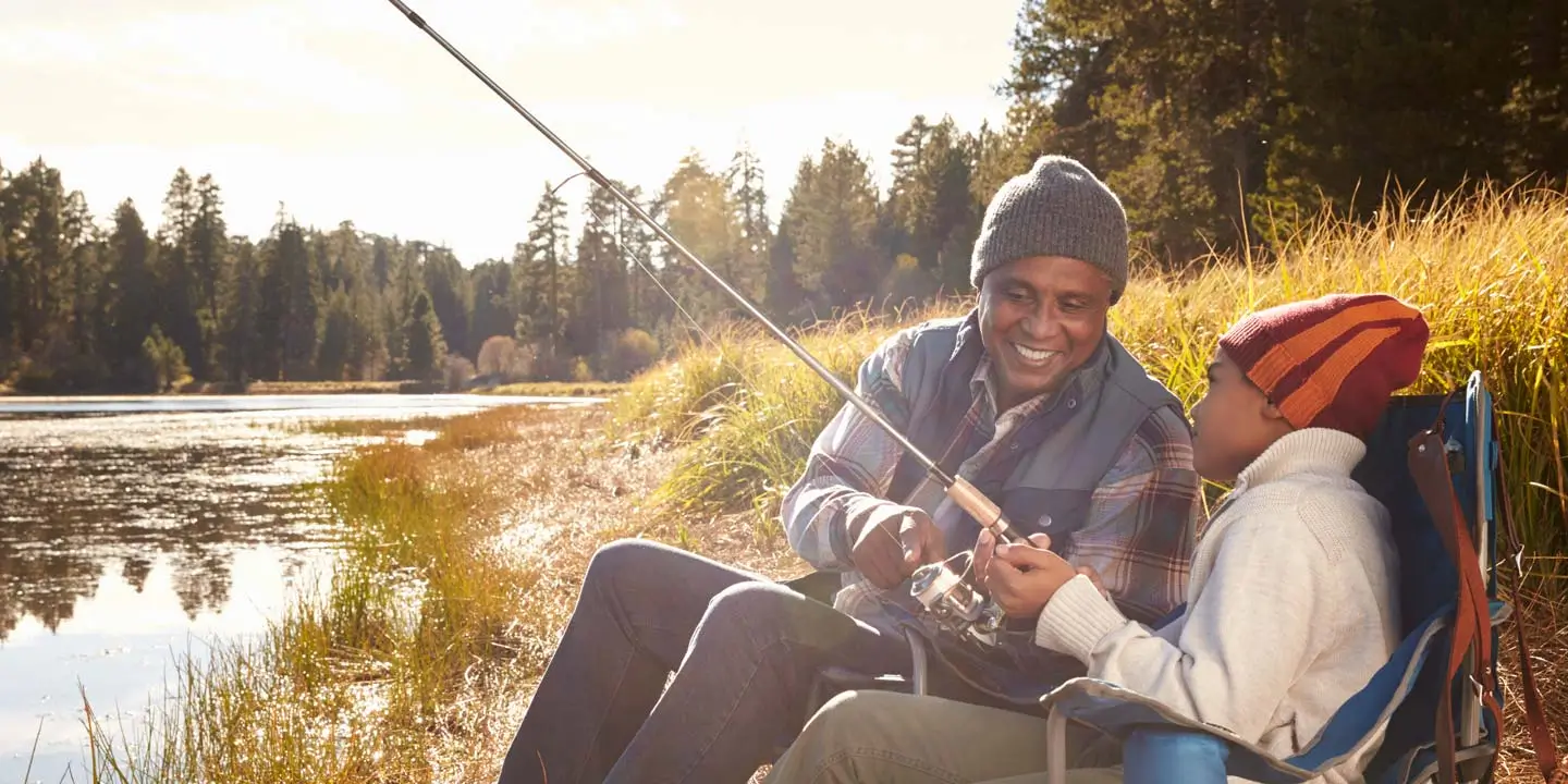 Senior and their grand child fishing together