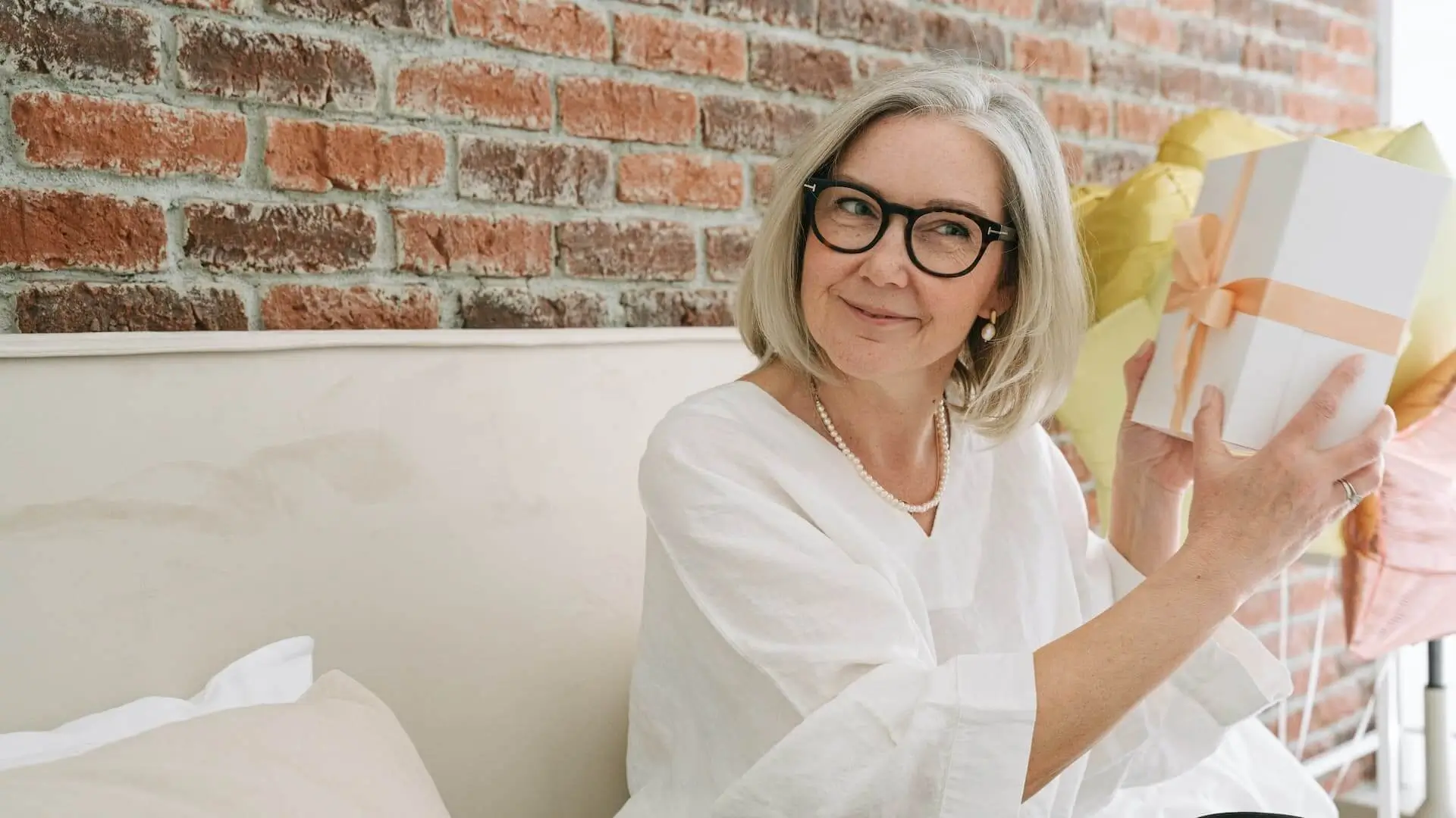 Woman in White Polo Shirt Wearing Eyeglasses