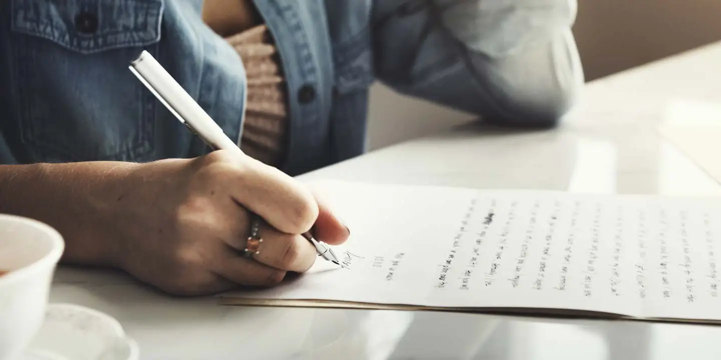 Woman writing a note