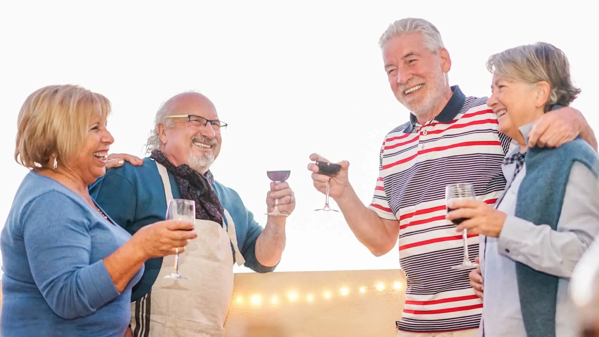 Senior couples drinking wine together having fun.