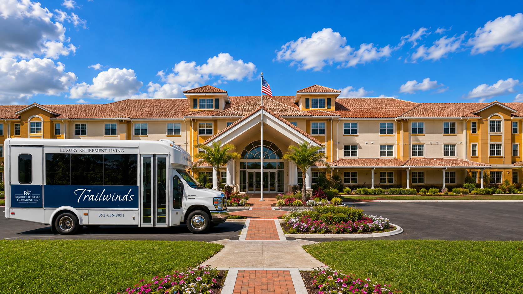 Trailwinds Retirement Community entrance in Wildwood, Florida, featuring the community entrance, landscaped grounds, and Trailwinds resident transportation shuttle.
