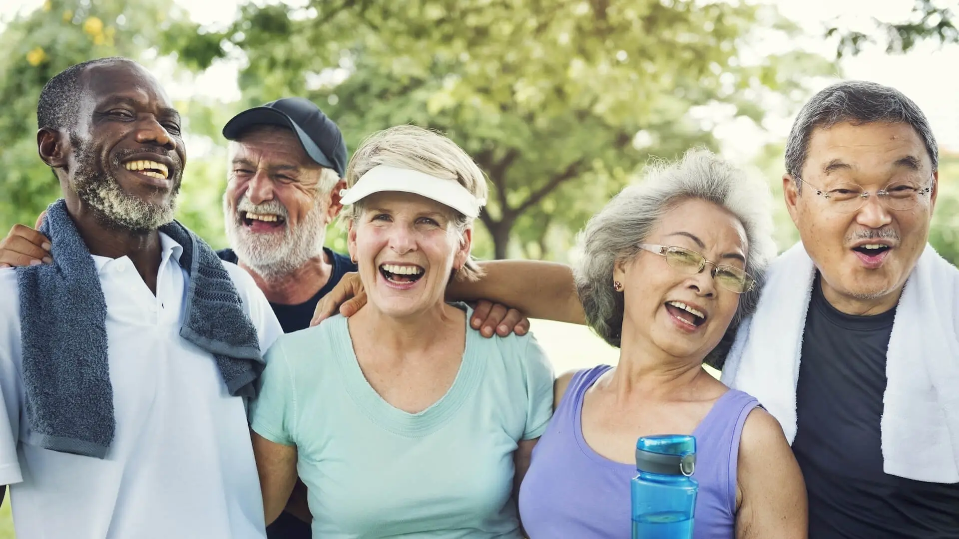 Group of senior friends exercise together