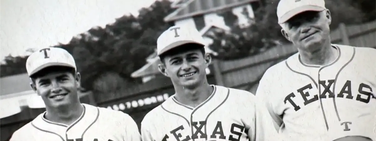 Charlie playing baseball at the University of Texas.