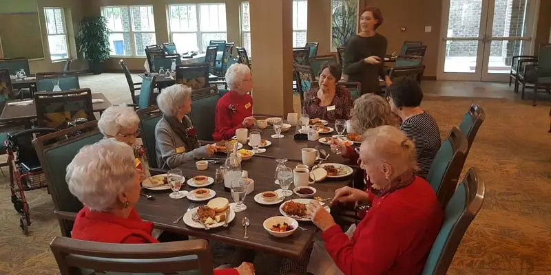 A group of senior ladies dining together.