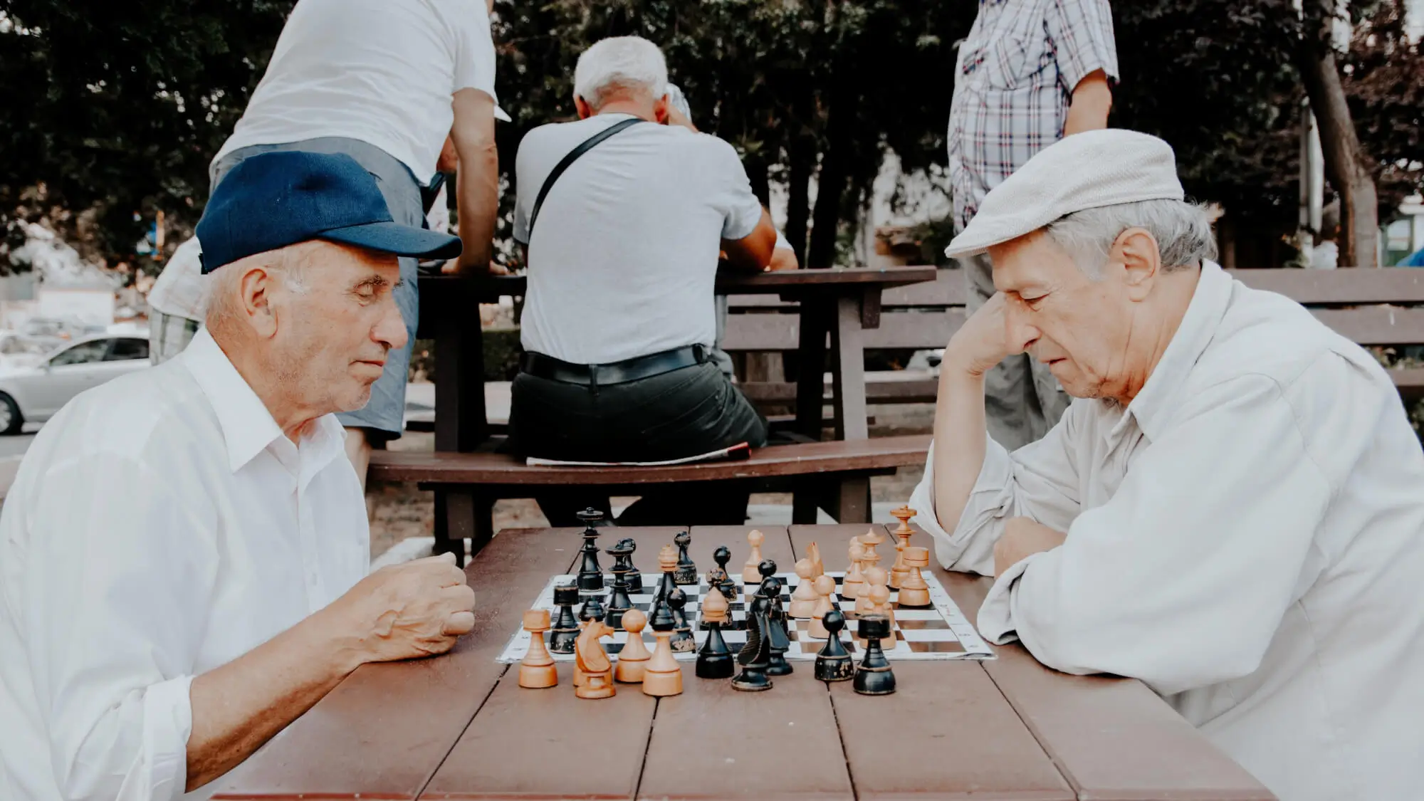 two older men playing chess