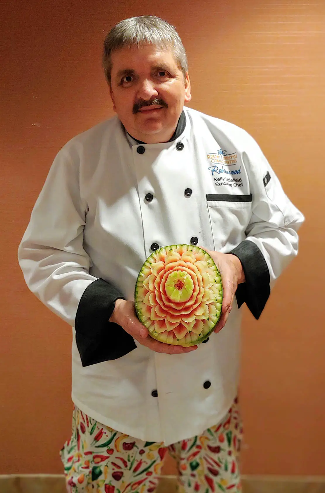 Chef Kelly showing off his carved watermelon.