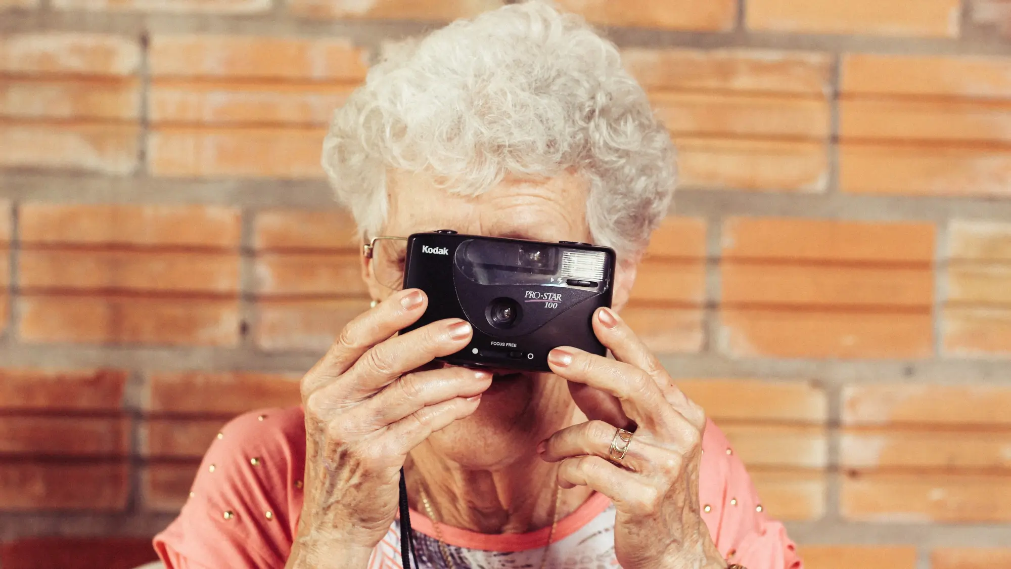  woman holding film camera