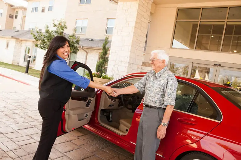 Resort Lifestyle Community resident receiving a valet from an employee.